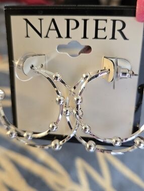 These NAPIER Silver-Tone Double-Hoop, pierced Earrings with Knobs are a stylish